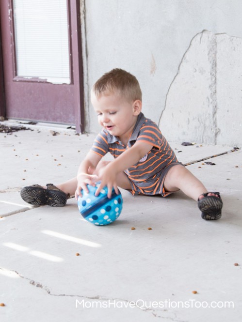 Throw and Roll a Ball to Improve Gross Motor Skills - Moms Have